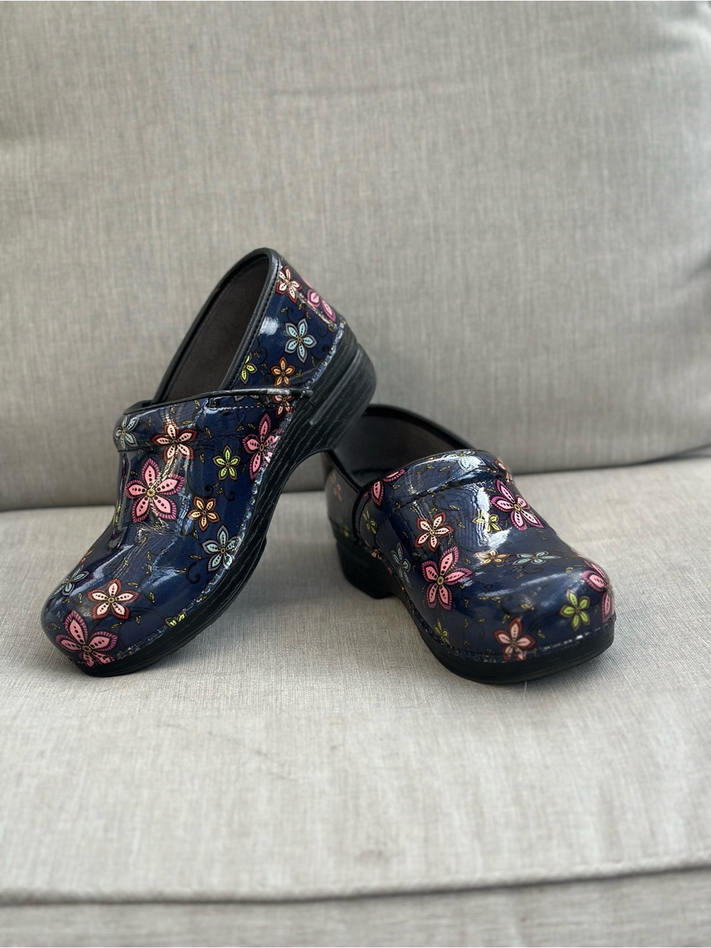Dansko Navy Floral Patent Clogs with Pink and Yellow Accents 38